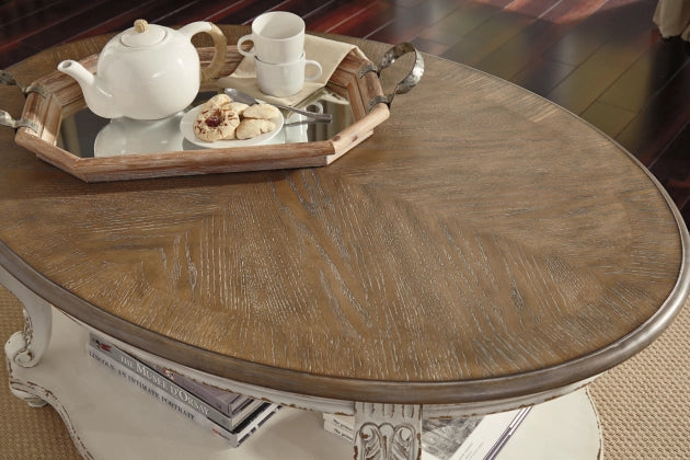 Realyn Coffee Table  SKU - T743-0